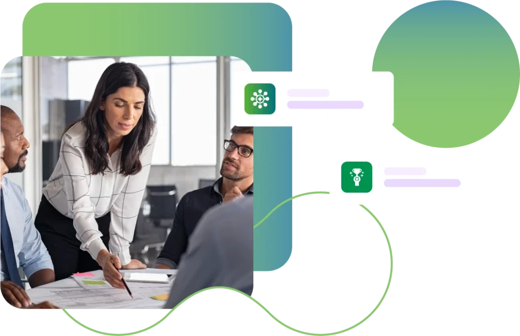 Lady pointing to document on desk whilst in a team meeting
